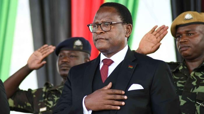 Malawi's newly elected President Lazarus Chakwera takes the oath of office in Lilongwe, Malawi, Sunday June 28, 2020.