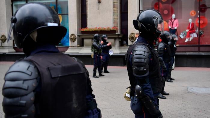 Riot police stand guard during demonstrations against police violence in Minsk, Belarus, September 6, 2020. 