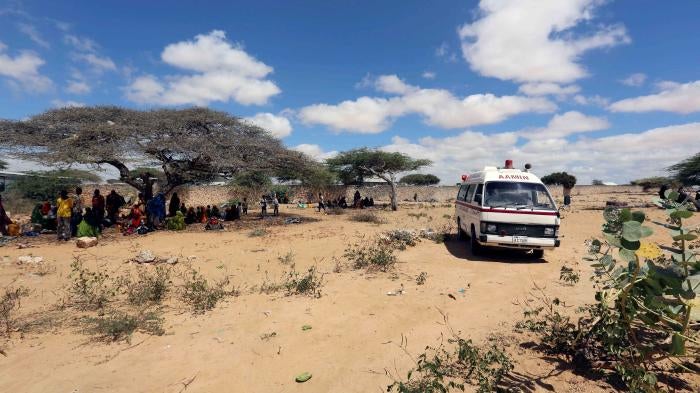 An ambulance transports patients to a  hospital from a camp for the internally displaced people on the outskirts Mogadishu, Somalia, March 2017.