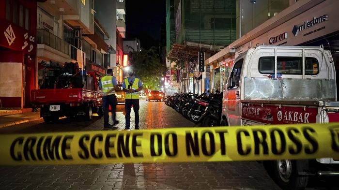 Maldivian police secure area following a blast targeting former President Mohamed Nasheed, Malé, Maldives, May 6, 2021.
