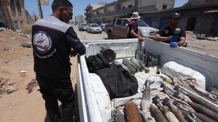 National Safety Authority members clear landmines and improvised explosive devices used during the armed conflict in Tripoli, Libya, June 3, 2020.
