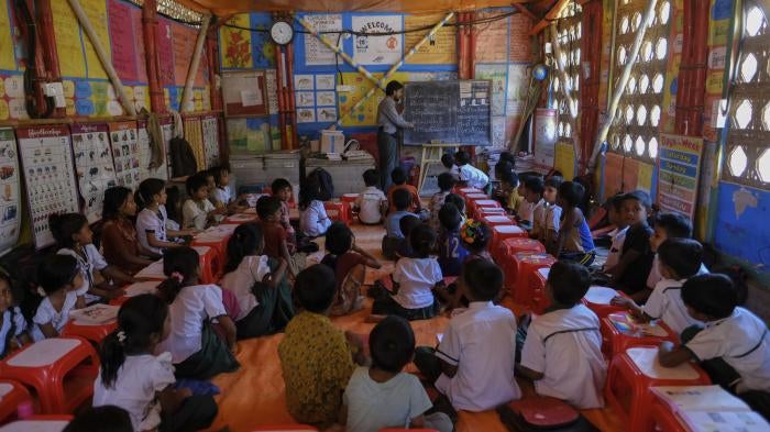 Rohingya refugee children in a school classroom at a refugee camp in the Cox's Bazar district of Bangladesh, March 9, 2023. 