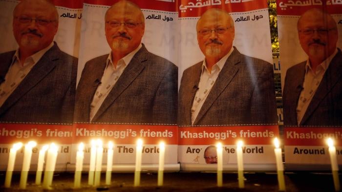 Candles lit by activists protesting the killing of Saudi journalist Jamal Khashoggi are placed outside Saudi Arabia's Consulate in Istanbul. © 2018 Lefteris Pitarakis/AP Photo