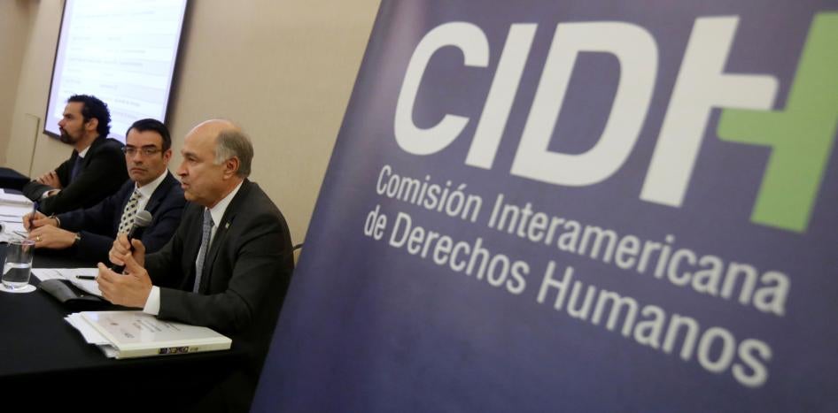 The Inter-American Commission on Human Rights’s (IACHR) then-executive director Paulo Abrao, then-president James Cavallaro, and then-member Enrique Gil Botero attend a news conference about the case of the missing students of the Ayotzinapa Teacher Training College in Guerrero, in Mexico City, Mexico, on November 10, 2016.