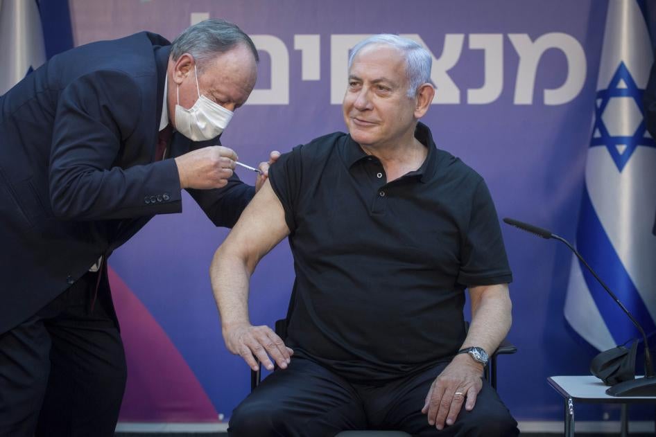 Israeli Prime Minister Benjamin Netanyahu receives the second dose of the Covid-19 vaccine in Ramat Gan, Israel on January 9, 2021.