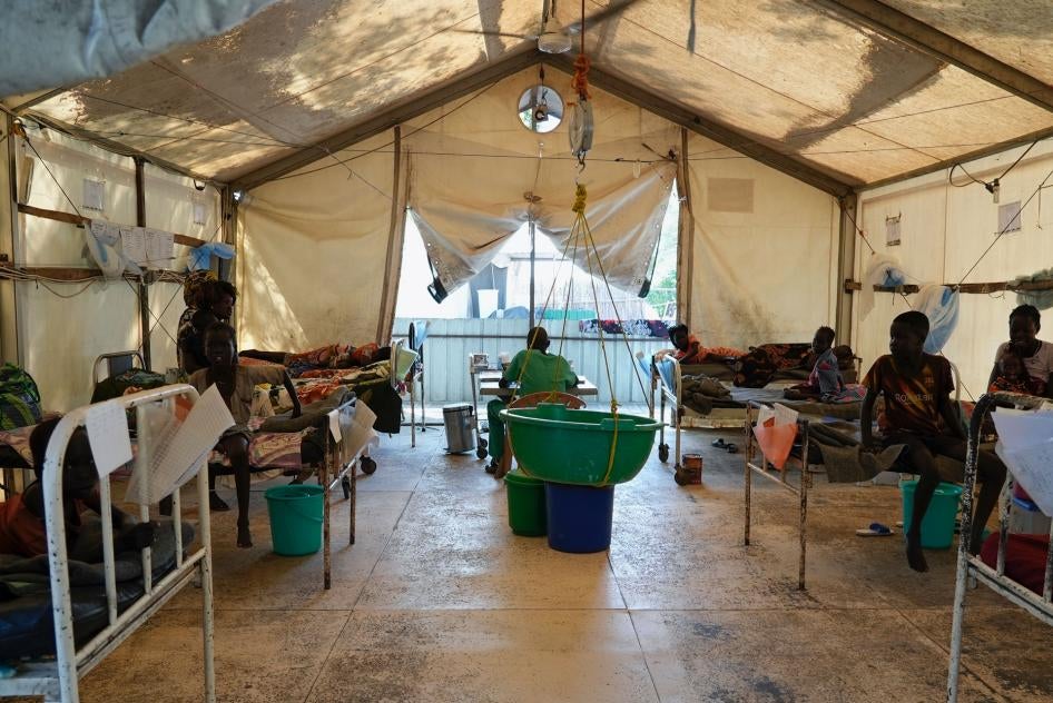 People are seen at a hospital run by Medicines Sans Frontieres (Doctors Without Borders) in Old Fangak in Jonglei state, South Sudan, December 28, 2021.