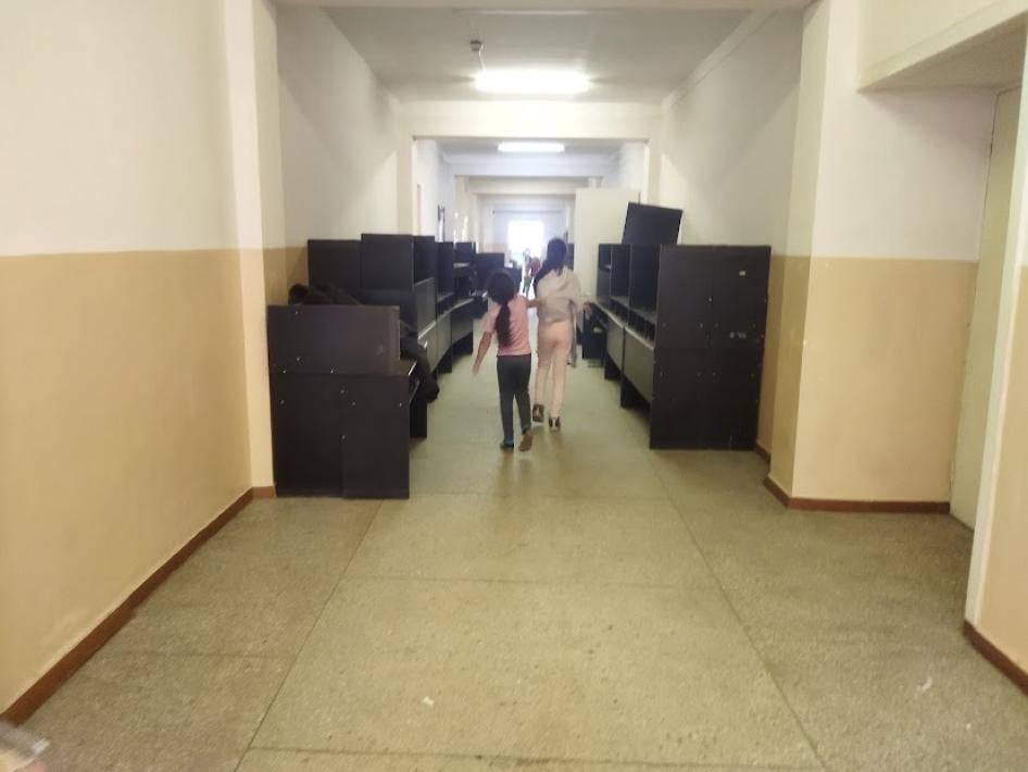 Two girls walking down the corridor of FRISPA, Chisinau, Moldova, end of March 2022.