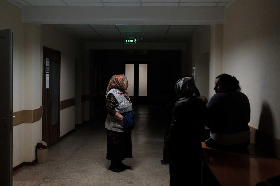 Refugees standing in the hallway of FRISPA center where most Romani refugees from Ukraine are accommodated, April 9, 2022. 