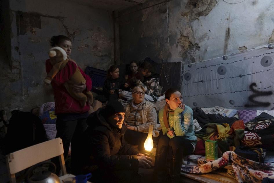 People settle in a bomb shelter