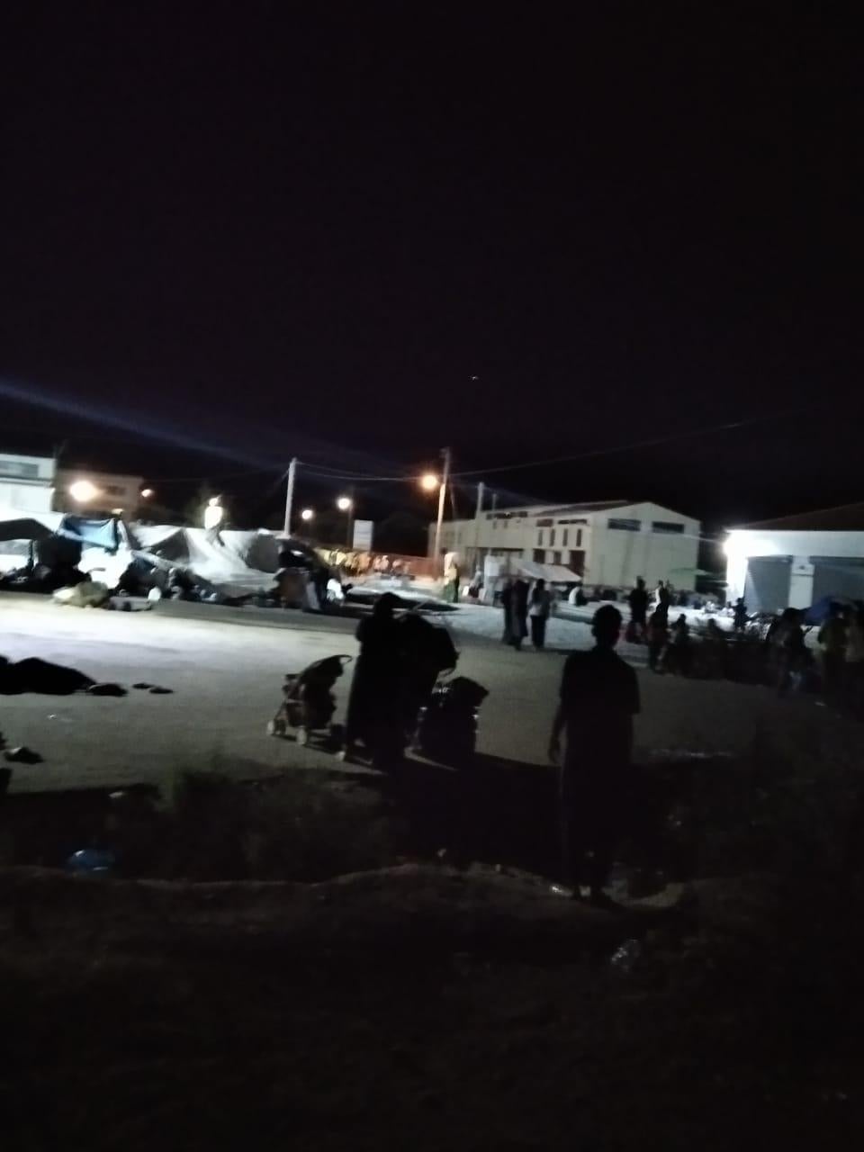A refugee camp at night