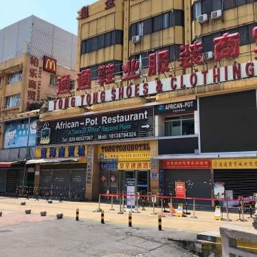An African restaurant is closed off along with other businesses in Guangzhou's Sanyuanli area, where a neighborhood is in lockdown after several people tested positive for the novel coronavirus disease, in Guangzhou, Guangdong province, China, April 13, 2020. 