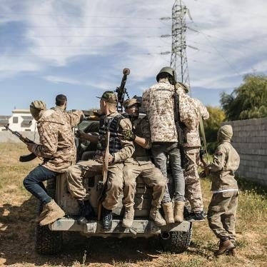 Fighters of Libya's UN-backed Government of National Accord (GNA) during clashes at the Ain Zara frontline, in the southern suburbs of capital Tripoli, with the forces of the Libyan National Army (LNA).