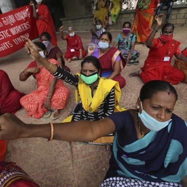 Women domestic workers, many of whom lost their jobs after the coronavirus outbreak, shout slogans at a protest demanding social security from the government in Bengaluru, India, June 15, 2020.
