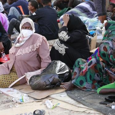Asylum seekers and refugees camped in front of a shuttered facility managed by the United Nations High Commission for Refugees (UNHCR)  in Tripoli,