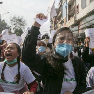 Nepalese women’s rights activists rallying in Nepal’s capital, Kathmandu, on February 12, 2021, to call for an end to violence and discrimination against women and the scrapping of a proposed law that would restrict travel for many women.