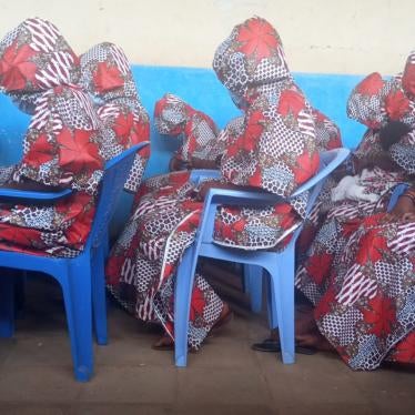 Survivors of the September 2020 mass rape at Kasapa central prison, veiled to protect their identity from the public, attend trial proceedings at Kasapa central prison, Lubumbashi, Democratic Republic of Congo, November 11, 2021.