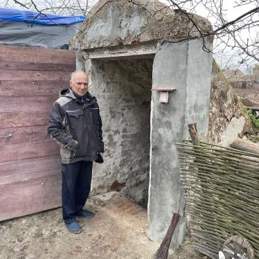 Volodymyr Ivashchenko shows the basement where he sheltered in the initial days of the war, together with his wife, mother-in-law, daughter, and 3-year-old grandson, in Yahidne, April 17, 2022.