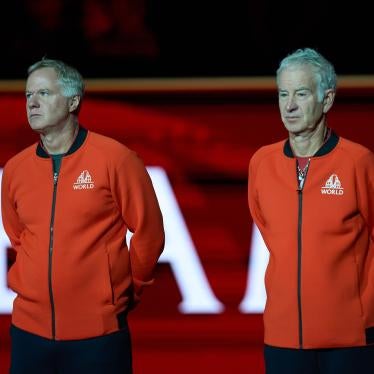 Patrick McEnroe (left) and John McEnroe Jr. arrive on court for the opening of the Laver Cup tennis event, London, September 23, 2022.