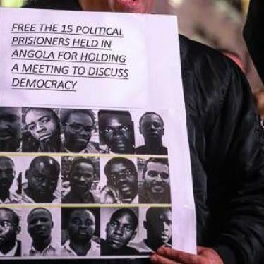 Protesters in London, stand at Piccadilly Circus calling for the release of 15 political prisoners in Angola, October 17, 2015. 