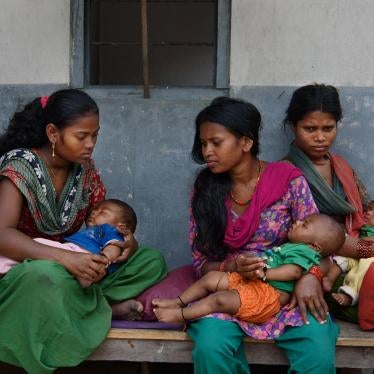 Manju M., 16, Tilmaya M., 18, and Sangeeta M., 19, wait with their children outside of a doctor’s office in Chitwan, Nepal. The parents of Manju M. arranged her marriage to a 19-year-old man when she was 15. Tilmaya M. eloped and married a 20-year-old man