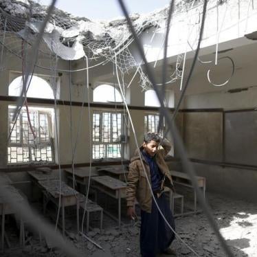 A boy stands in a classroom at his school after it was hit by a Saudi-led air strike in Yemen's capital Sanaa July 20, 2015.