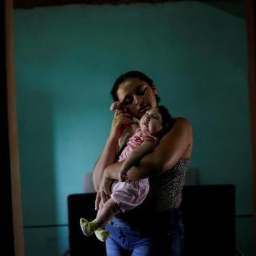 Raquel, 25, holds her daughter Heloisa in Areia, Paraíba state, Brazil. Raquel gave birth to twin daughters with Zika syndrome in April 2016. “I want to give my best to my daughters,” she said in an interview with Human Rights Watch.