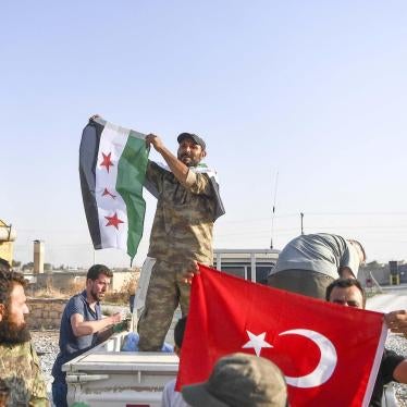 Fighters of the Turkish-backed Free Syrian Army (also called the Syrian National Army) enter the town of Tal Abyad.