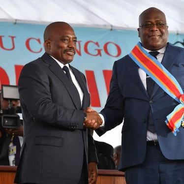 Incoming Democratic Republic of Congo’s President Felix Tshisekedi (right) and outgoing President Joseph Kabila in Kinshasa on January 24, 2019, after Tshisekedi was sworn into office.