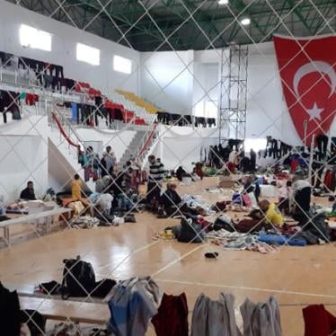 175 Syrian asylum seekers were held in a sports hall in the Turkish controlled part of northern Cyprus for two days before being transferred to apartment buildings where they continue to be detained. Photo taken in March 2020.