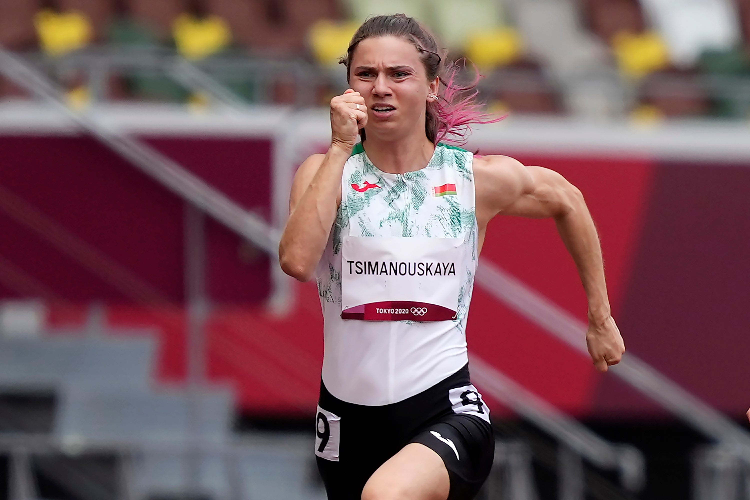 A female athlete sprinting in a race