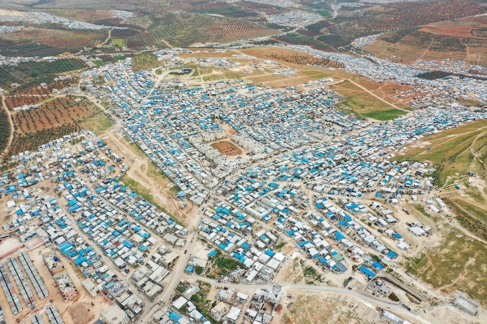 A drone image taken on April 21, 2020, shows a general view of the camp for internally displaced people pictured near Kah, in the northern Idlib province near the border with Turkey.
