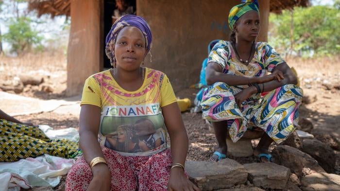 Women from Hamdallaye village, in Guinea’s Boké region, in 2018. In 2020, Hamdallaye was relocated to a new site by La Compagnie des Bauxites de Guinée, a mining company backed by mining giants Alcoa, Rio Tinto, and Dadco. The new site lacks adequate farmland, housing, water and sanitation.