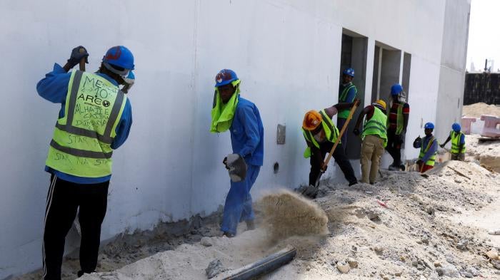 Workers at a construction site in Dubai, United Arab Emirates, August 15, 2023.