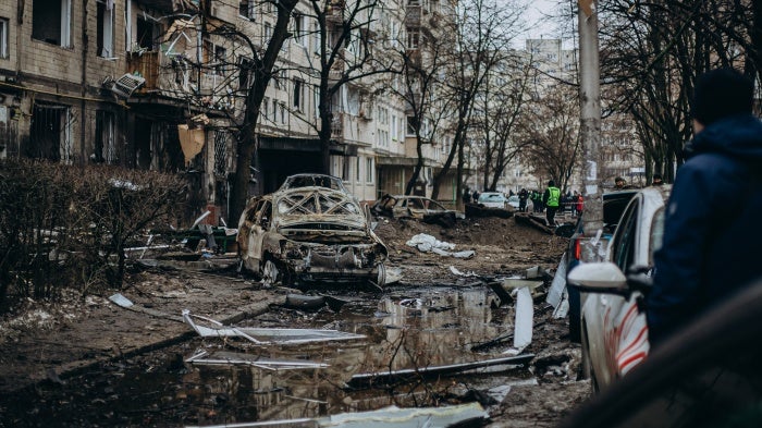 The aftermath of an explosion of an intercepted Russian missile on a residential building in Kyiv, Ukraine, December 13, 2023.