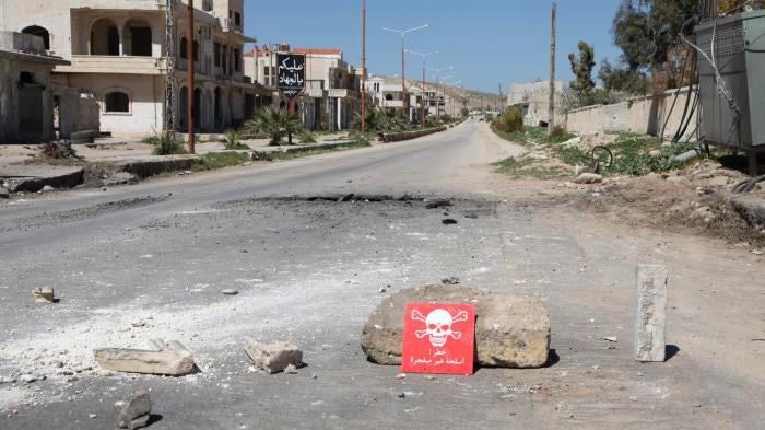 A poison hazard danger sign is seen in the town of Khan Sheikhoun, Idlib province, Syria on April 5, 2017. 