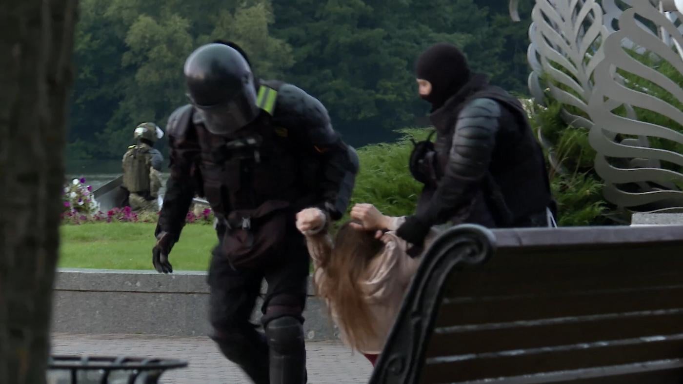 Belarusian security forces dragging protester