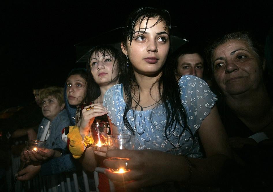 Церемония памяти в Гори, северо-западнее Тбилиси, спустя год после начала августовской войны 2008 г. между Грузией и Россией вокруг Южной Осетии. © 2008 REUTERS/David Mdzinarishvili