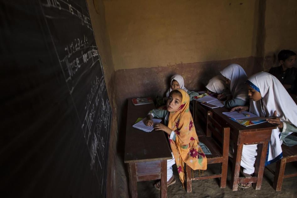 Girls attend lessons at a school on the outskirts of Islamabad.
