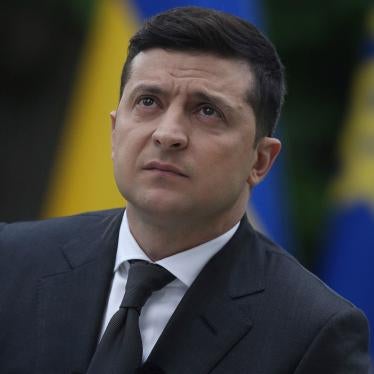 Ukraine President Volodymyr Zelensky looks on during a press conference in the garden of the Mariinsky Palace in Kyiv, May 22, 2020.