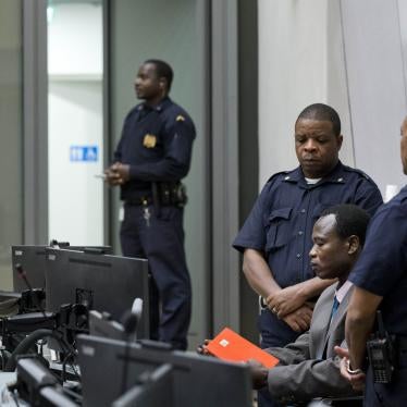 Dominic Ongwen, a senior commander in the Lord's Resistance Army, sits in the court room of the International Court in The Hague, Netherlands