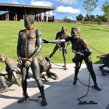 A sculpture of African slaves by Ghanaian artist, Kwame Akoto-Bamfo, at the beginning of the National Memorial for Peace and Justice in Montgomery, Alabama. 