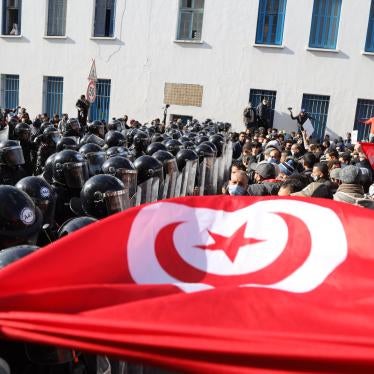 Protesters calling for political reform and social justice measures clash with police in front of the parliament headquarters.