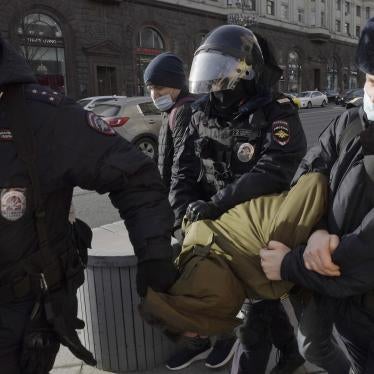 Police officers detain a protester in Manezhnaya Square, Moscow, Russia on March 6, 2022.