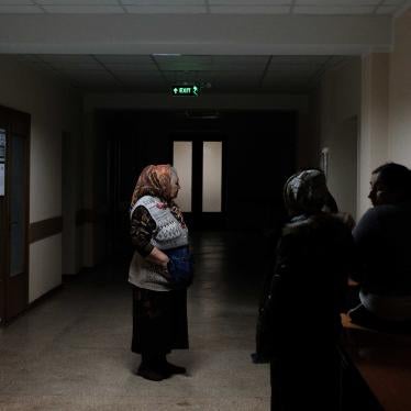 Refugees standing in the hallway of FRISPA center where most Romani refugees from Ukraine are accommodated, April 9, 2022. 