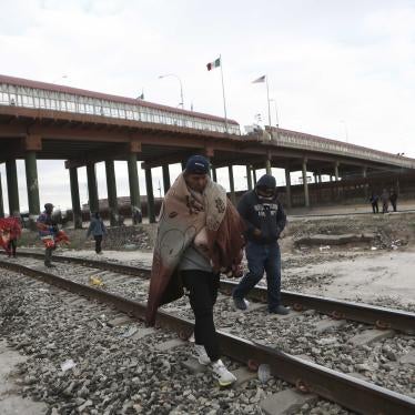 Venezuelans walk near a bridge that crosses the Rio Grande River after being expelled from the United States into Ciudad Juarez, Mexico, Tuesday, Oct. 18, 2022. The Biden administration announced on Oct. 12, that Venezuelans who cross the border irregularly will be immediately expelled to Mexico without being allowed to seek asylum.