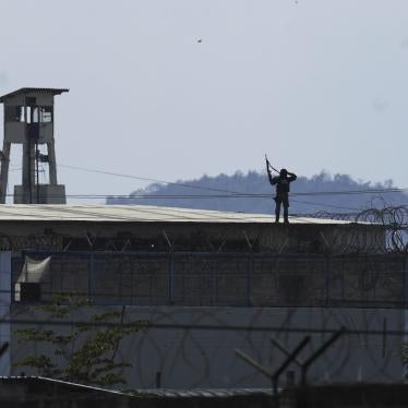 Police walk on the roof of Litoral Penitentiary amid days of deadly clashes inside the prison, triggered by the transfer of hundreds of inmates in Guayaquil, Ecuador, Friday, Nov. 4, 2022. 120 people were killed in prison massacres in 2022. 