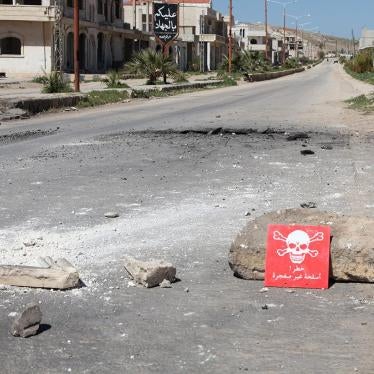 A poison hazard danger sign is seen in the town of Khan Sheikhoun, Idlib province, Syria on April 5, 2017. © 2017 Abdussamed Dagul/Anadolu Agency/Getty Images