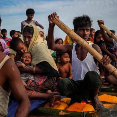 Rohingya refugees cross the Naf River with an improvised raft to reach to Bangladesh in Teknaf, Bangladesh, November 12, 2017. Picture taken November 12, 2017. REUTERS/Mohammad Ponir Hossain TO FIND ALL PICTURES SEARCH REUTERS PULITZER