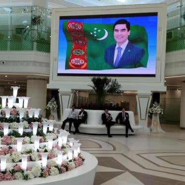 A screen showing a portrait of Turkmen President Kurbanguly Berdymukhamedov inside the terminal of the newly built airport in Ashgabat