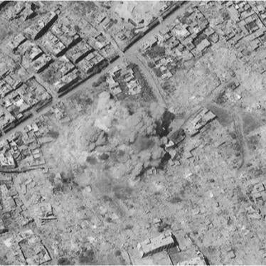 Satellite image of a large blast cloud from the demolition of a residential apartment building with high explosives. Blast cloud consistent with the detonation of a large conventional bomb